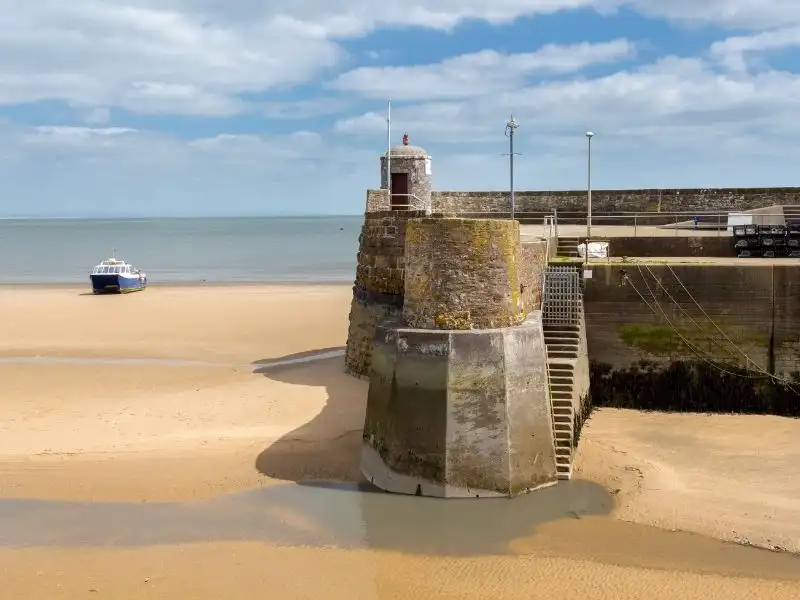 Saundersfoot Lighthouse at the coastline. Visit this scenic spot with Z Cars, your trusted provider of Saundersfoot taxis